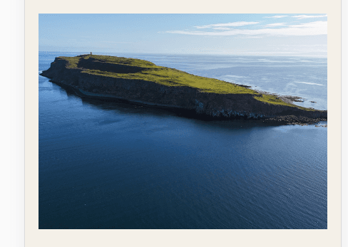 Aerial view of Grímsey island on Steingrímsfjörður, Westfjords Iceland